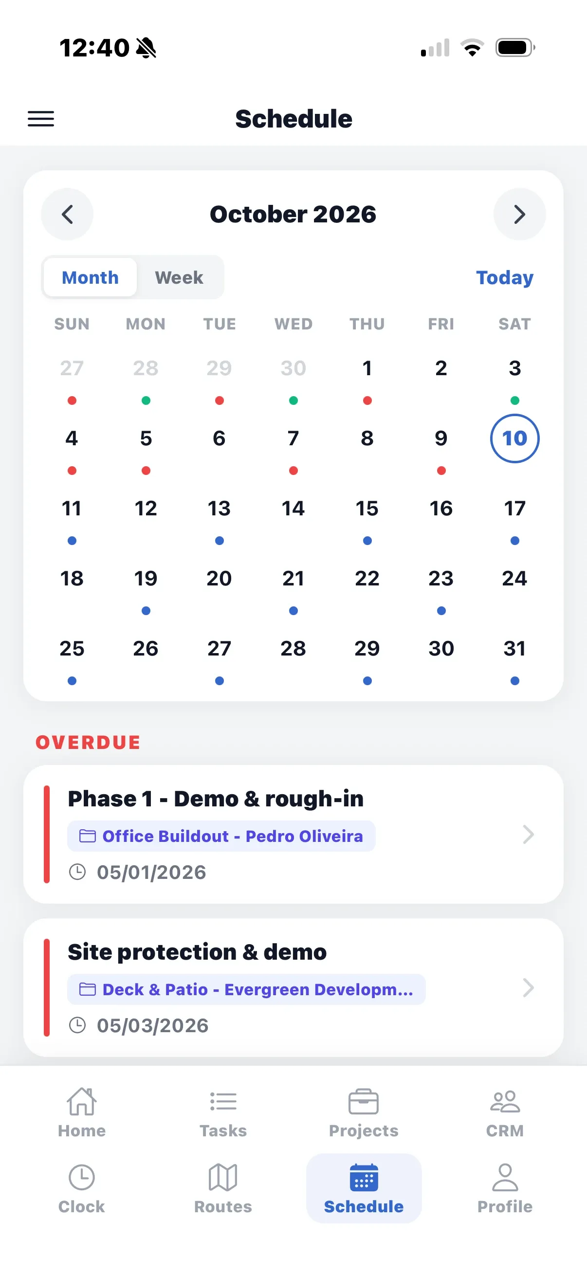 The Schedule screen: a month calendar with task markers and an overdue list below.